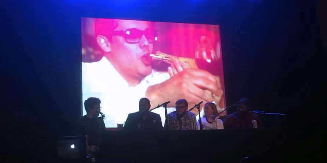 Our panel, dwarfed by an image of Andre Darlington indulging in bone luge. Photo by Daniella Echeverria.