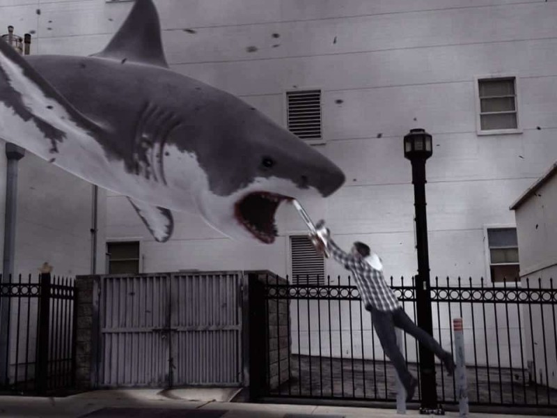 Former surfer Fin Shepard (Ian Ziering) uses a chainsaw to fight a giant CGI shark.