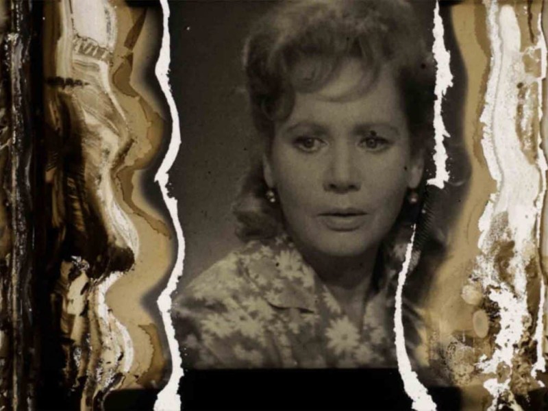 A witness appears in a weathered, recovered frame of Ivan Lukinsky’s 1969 mystery film "The Village Detective."