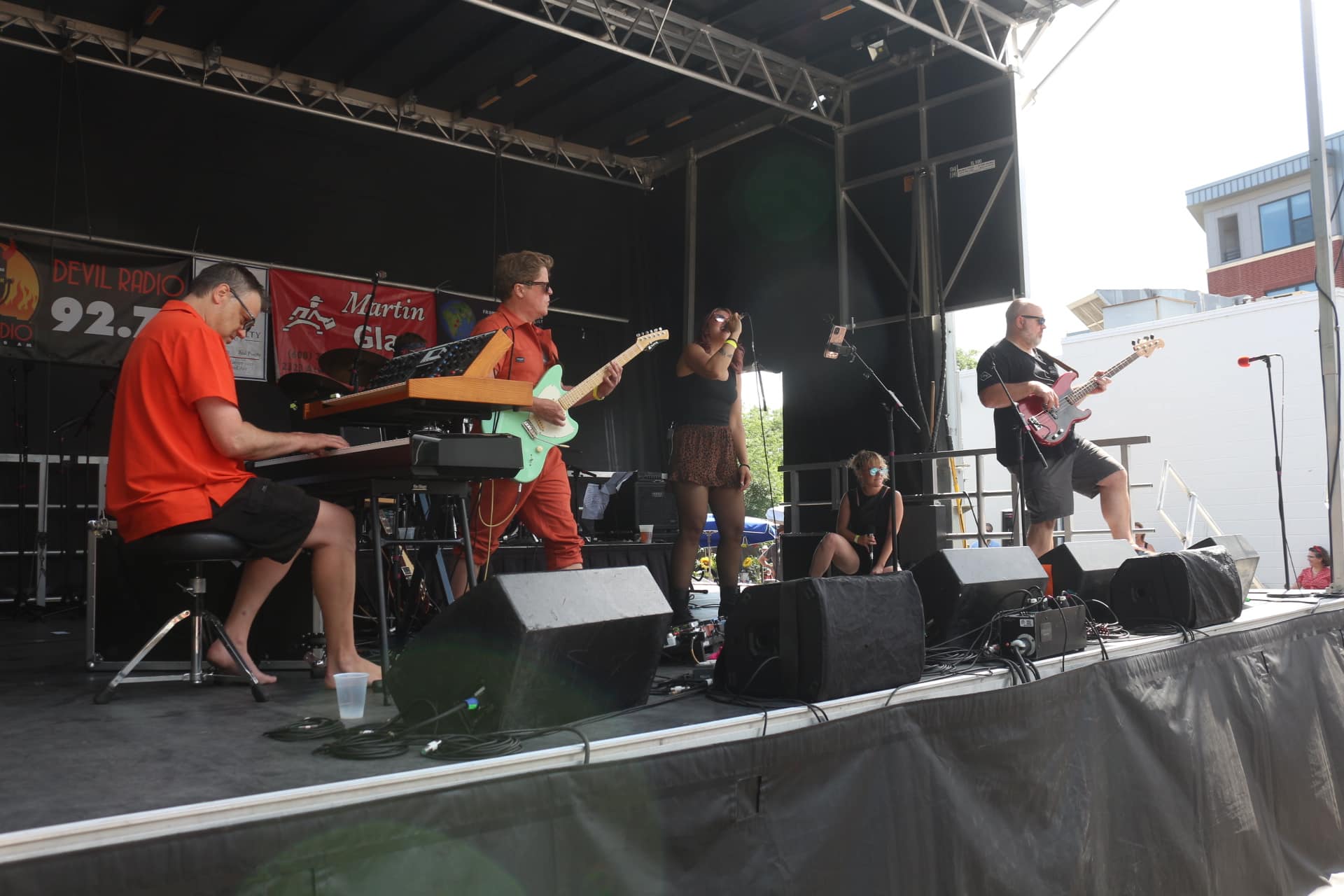 Little Earthquakes are shown performing on an outdoor stage during the 2022 edition of AtwoodFest.