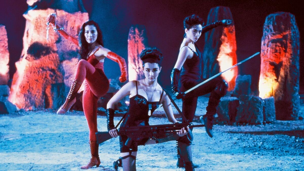 Actors Michelle Yeoh, Maggie Cheung, and Anita Mui (left to right) strike a theatrically imposing pose in "The Heroic Trio."