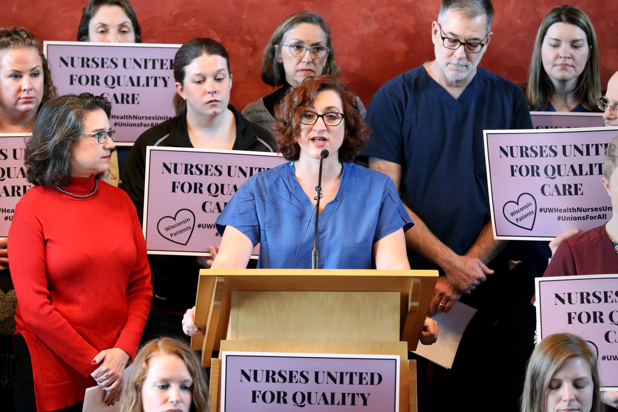 Mariah Clark, an emergency department nurse, speaks as University of Wisconsin Hospitals and Clinics nurses announce a new union during a press conference at the First Unitarian Society in Madison, Wis., on Dec. 19, 2019. (Coburn Dukehart / Wisconsin Watch)