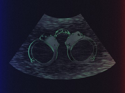 An ultrasound with a pair of handcuffs and green highlights sits on a dark background with blue and red gradients on each side.