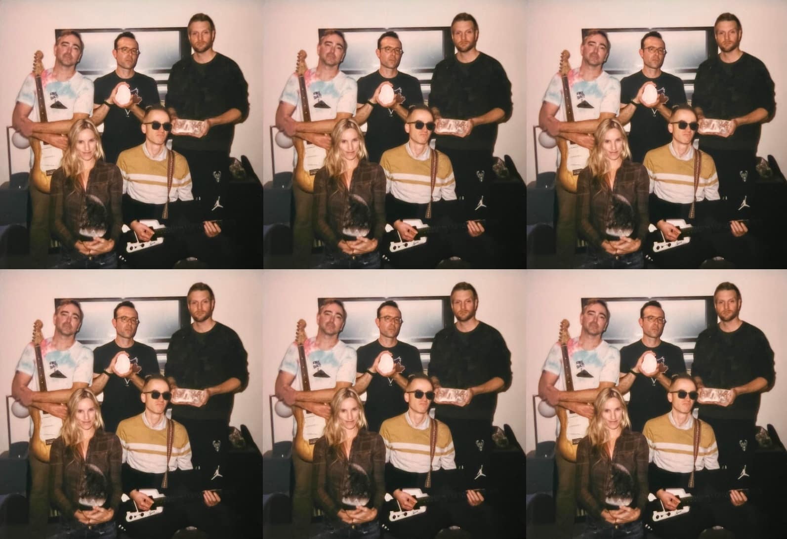 All of the current Cribshitter members are shown posing in a room, the image is repeated across six tiles.