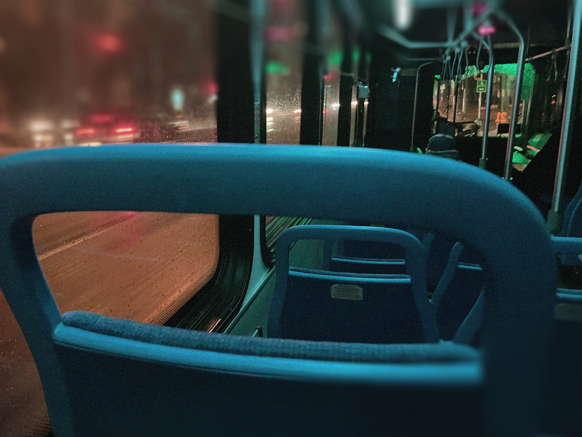 Photo of interior of a Madison Metro bus at night.