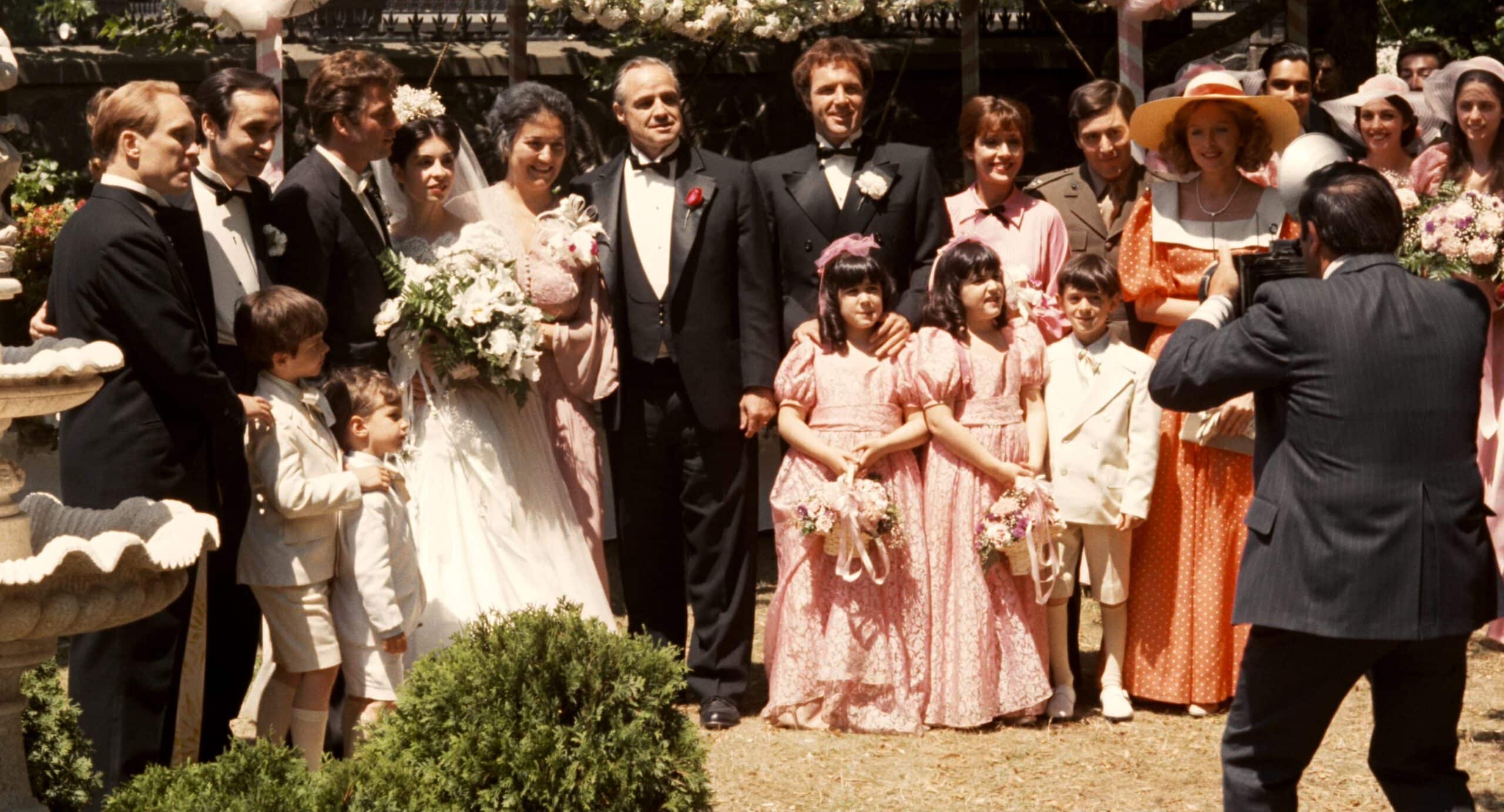 The Corleones pose for a photographer at the wedding of Constanzia "Connie" Corleone (Talia Shire) and Carlo Rizzi (Gianni Russo). Don Vito (Marlon Brando) stands in the middle.
