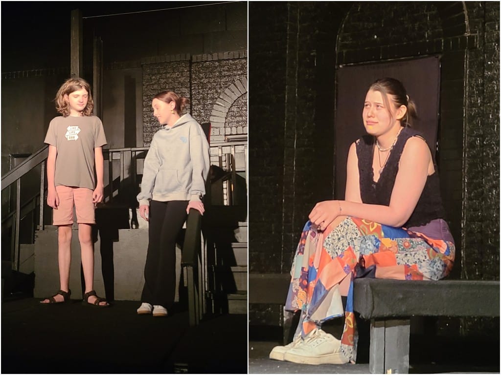 A basic landscape-oriented collage is split vertically between two photos of teenage actors on a basic black-painted rehearsal stage. They are all dressed in casual clothes, not character costumes. On the left, at a medium shot, two actors stand and partly face one another mid-conversation while leaning near a railing by some steps. On the right, at a close-up, a female actor sits on the edge of the stage with a pained, upset expression. She looks off to the left.