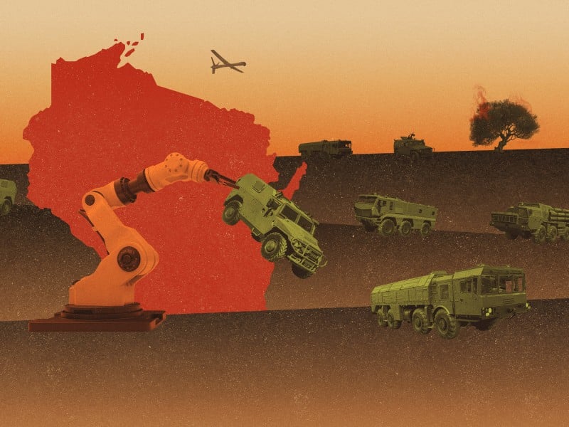 An illustration shows several military vehicles in the foreground, middleground, and background on different levels of desert terrain. One of the vehicles is being held by an oversized robotic arm that is sitting in the foreground on a large red outline of the state of Wisconsin. In the background, a drone flies in the sky overhead and an olive tree smolders on the ground.