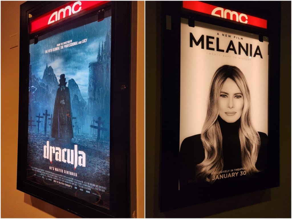 A simple image collage that is split in a vertical orientation. The left image shows a poster light box for Luc Besson's "Dracula" that features the AMC logo in white text on a red-bar background at the top. The surrounding wall is painted a golden-brown color. The right image shows the poster for Brett Ratner's "Melania" in a similar light box. The wall surrounding the poster is painted black.